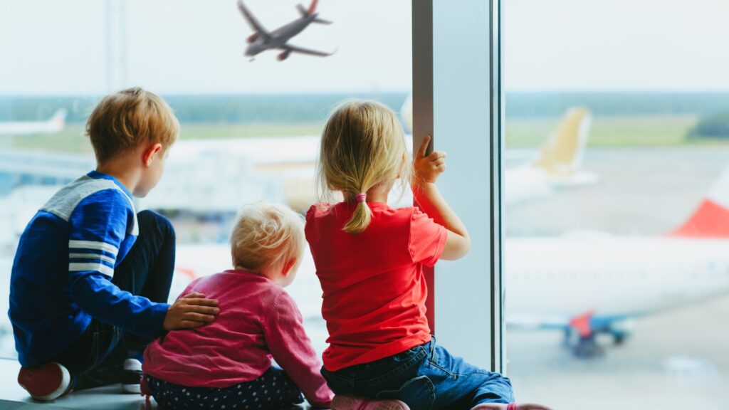 Children at an airport after a consent letter for children travelling abroad was given
