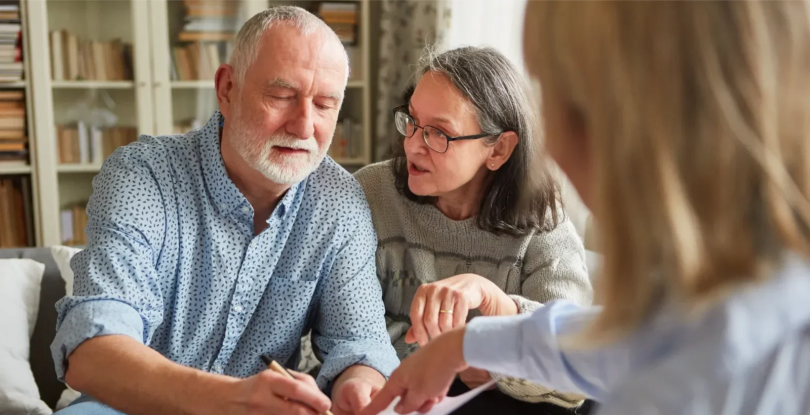 Power of Attorney for buying and selling property represented by an older couple of signing a Power of Attorney.
